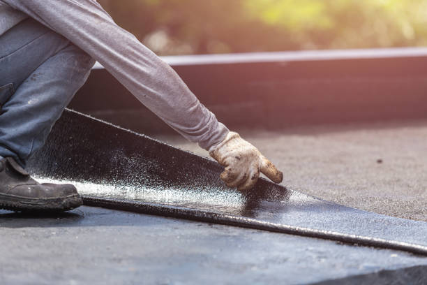Professional Basement Waterproofing technician working in Massapequa, NY